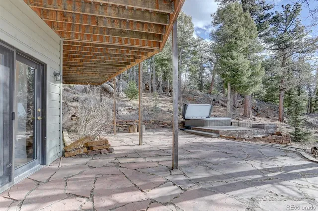 a view of a backyard of the house