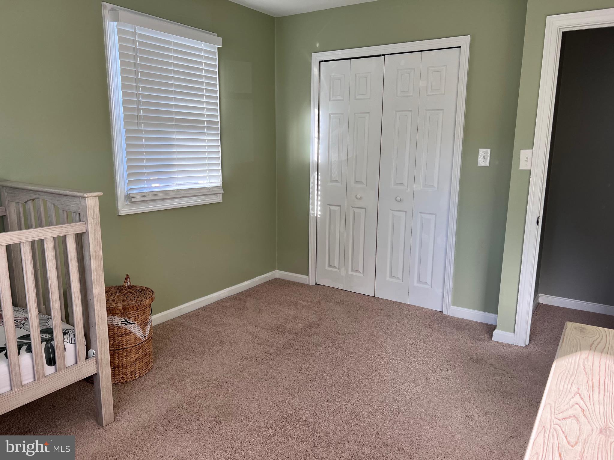 216 Fenimore Lane Delanco, NJ 08075 - Photo 17 of 25 a view of a livingroom with an empty space and a window