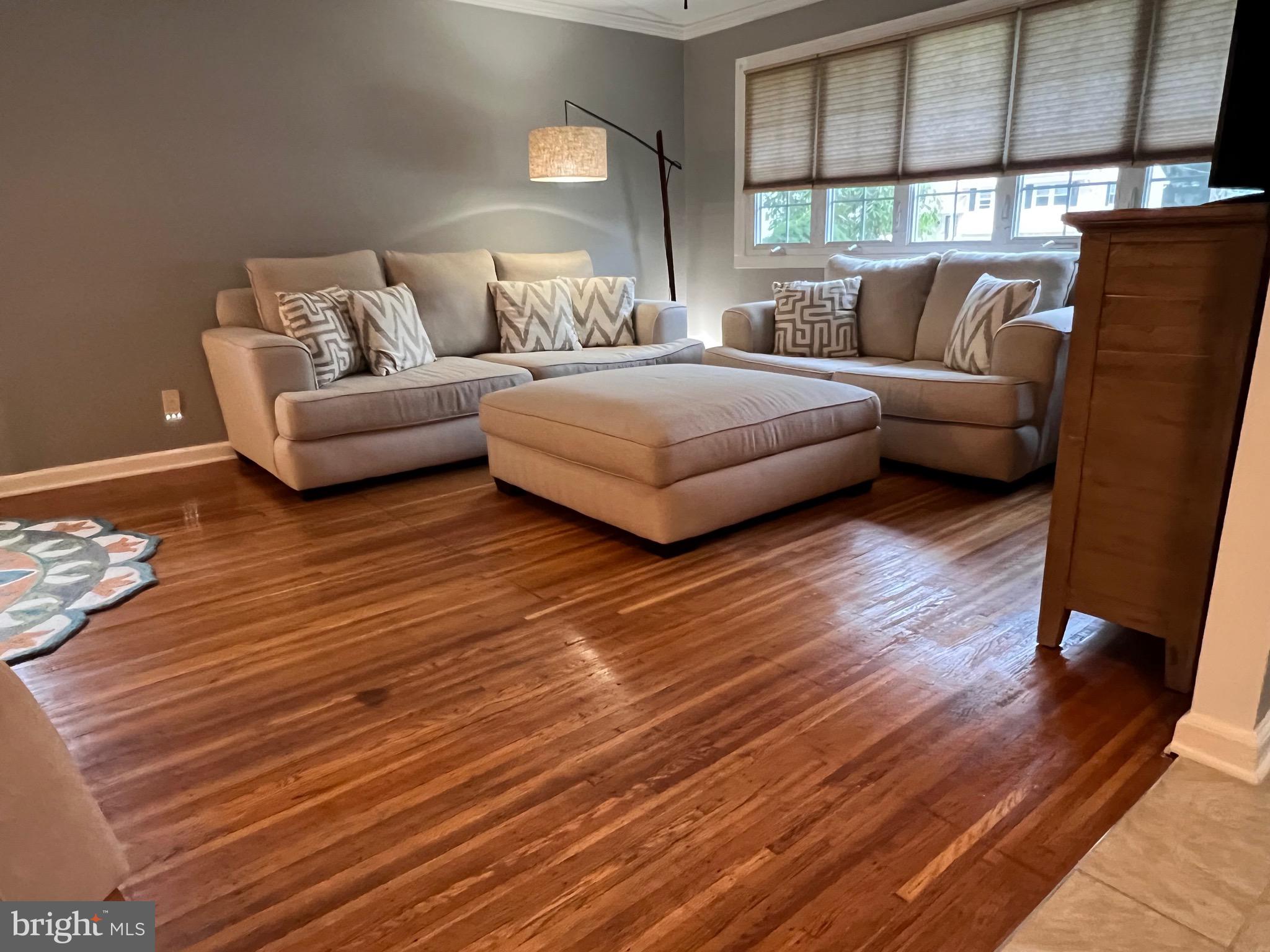 216 Fenimore Lane Delanco, NJ 08075 - Photo 3 of 25 a living room with furniture and a large window