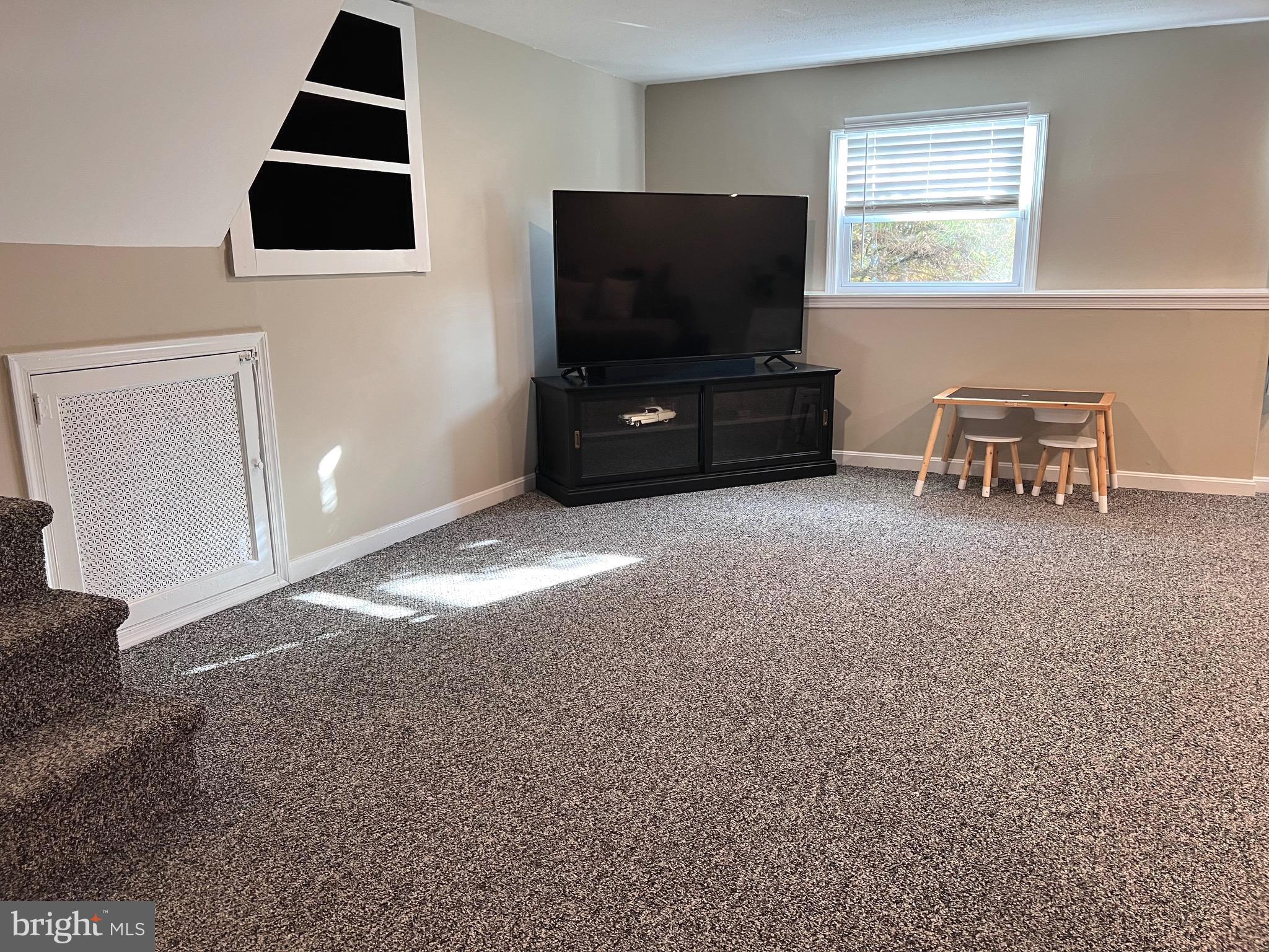 216 Fenimore Lane Delanco, NJ 08075 - Photo 9 of 25 a living room with furniture and a flat screen tv