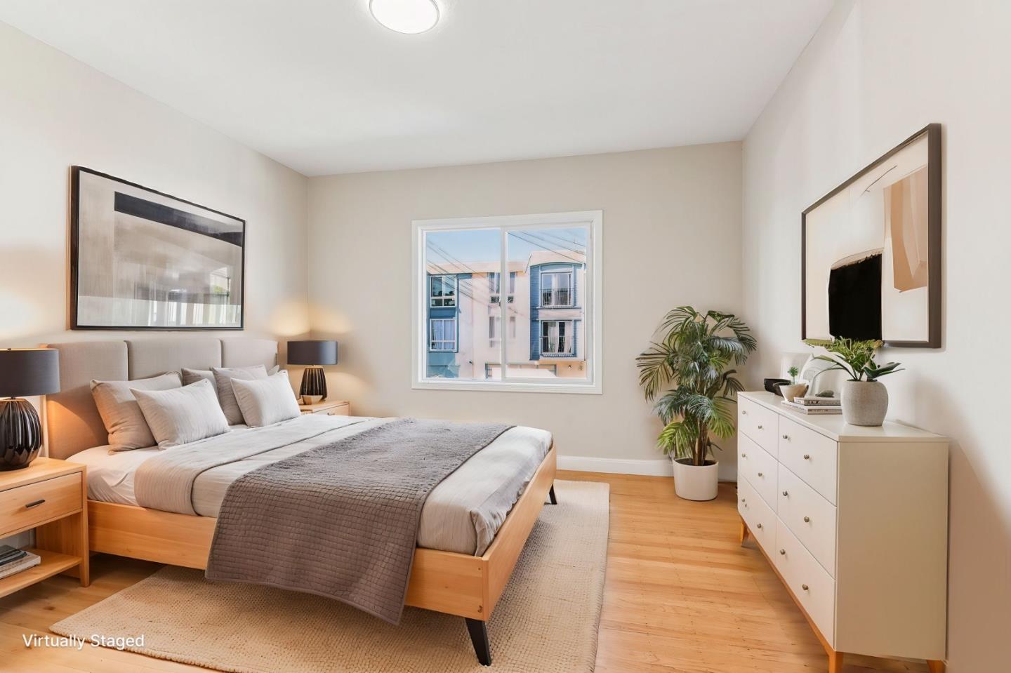 136 Chester Street Daly City, CA 94014 - Photo 20 of 48 a spacious bedroom with a balcony a large bed and a flat screen tv