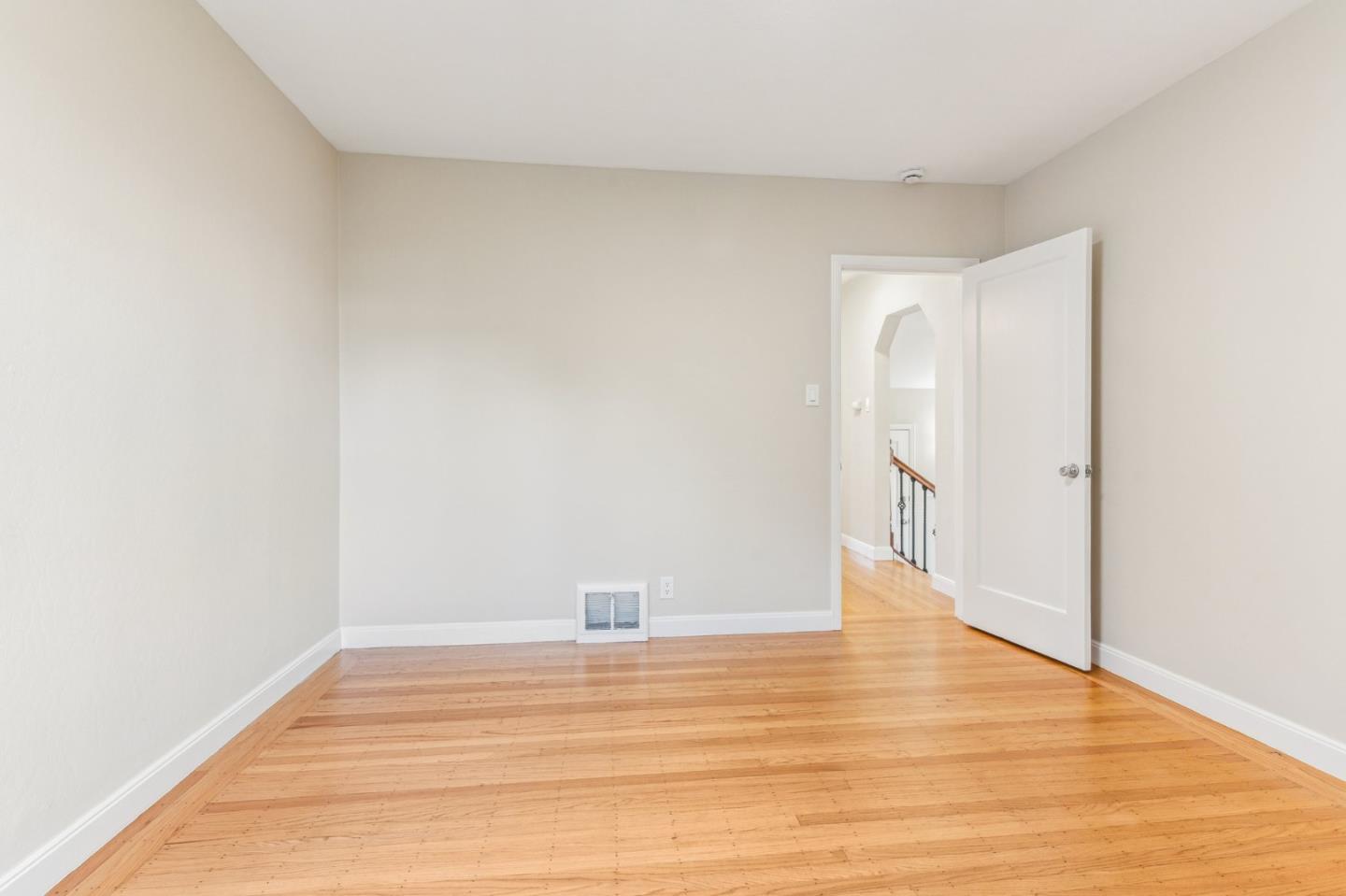 136 Chester Street Daly City, CA 94014 - Photo 25 of 48 a view of an empty room with wooden floor