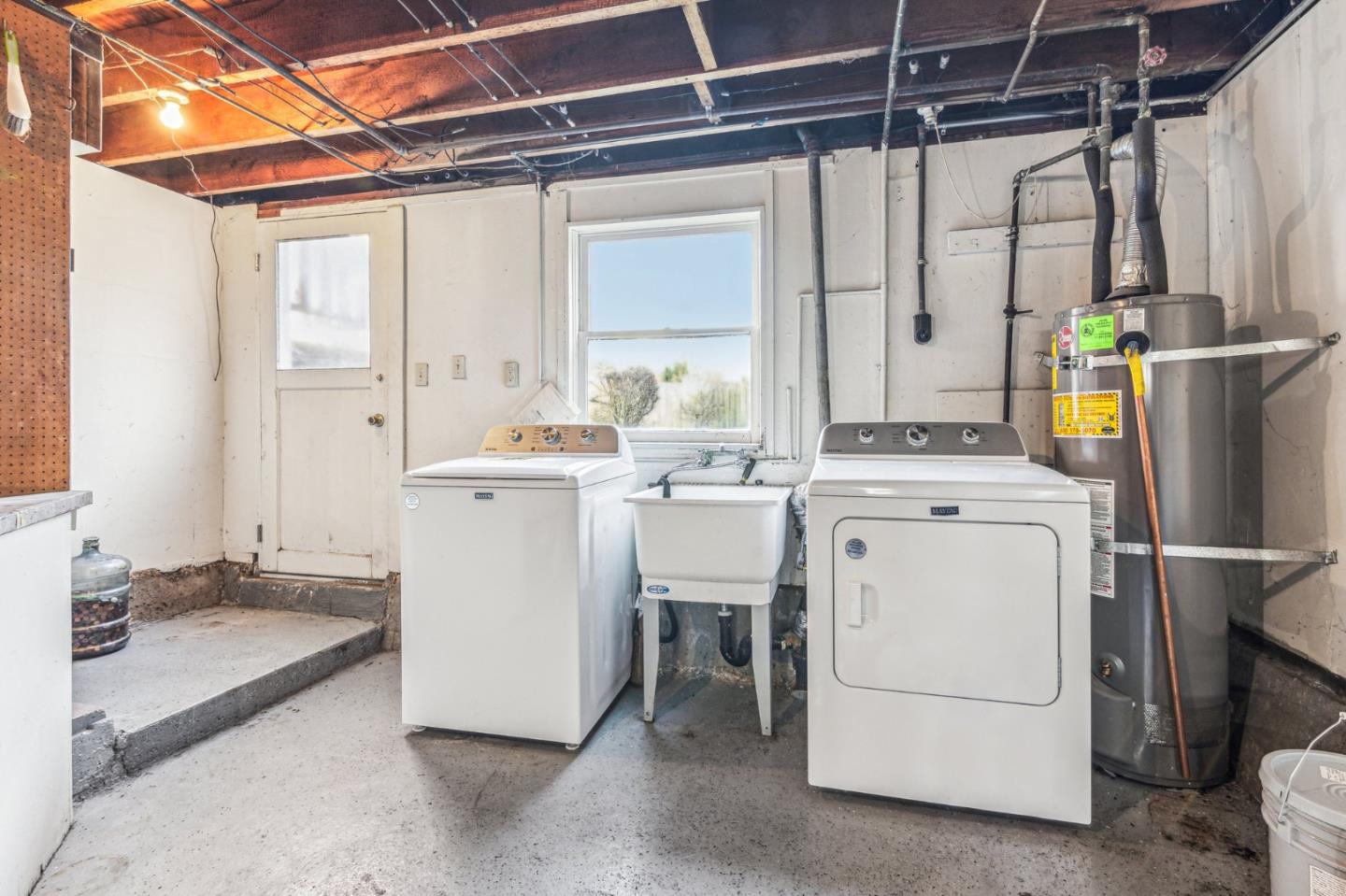 136 Chester Street Daly City, CA 94014 - Photo 28 of 48 a utility room with dryer and washer