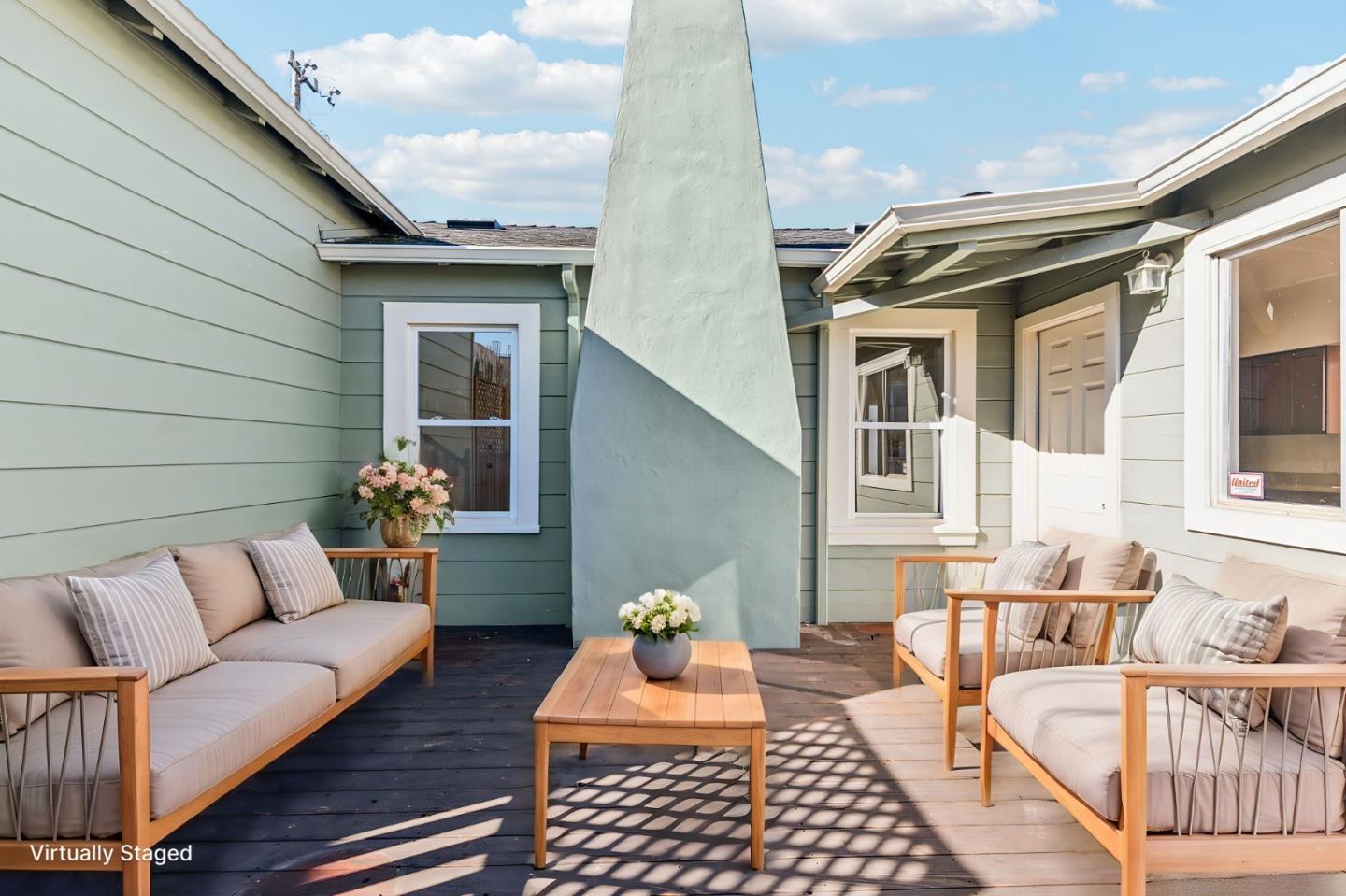 136 Chester Street Daly City, CA 94014 - Photo 30 of 48 a view of a patio with couches chairs and wooden floor