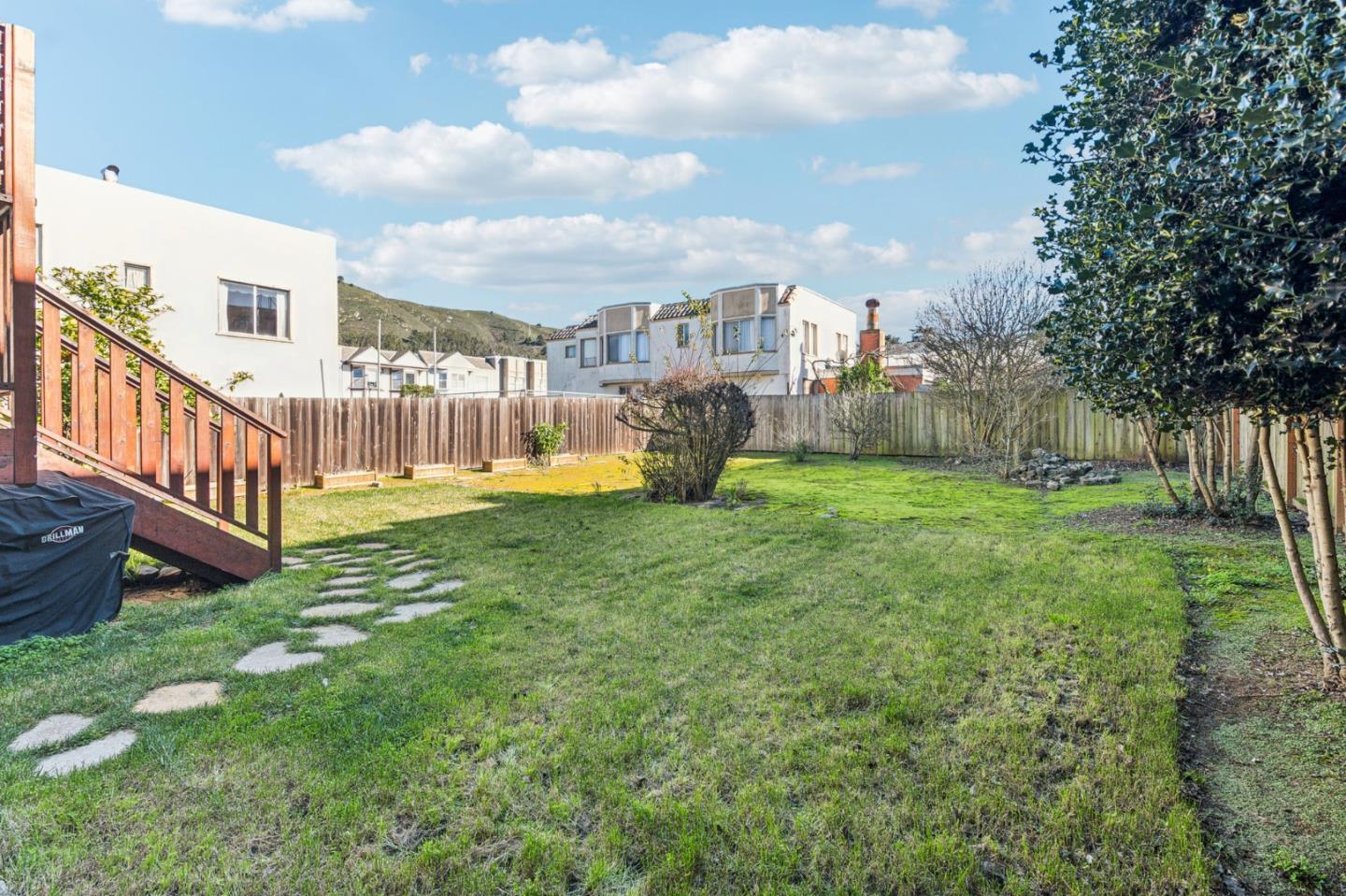 136 Chester Street Daly City, CA 94014 - Photo 35 of 48 a view of a house with a yard and sitting area