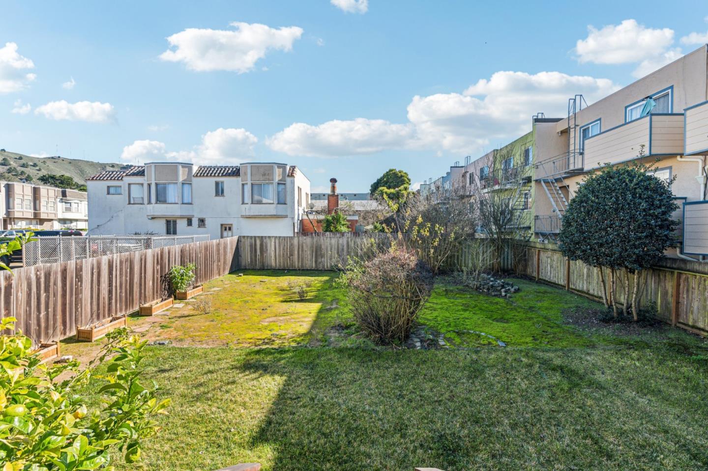 136 Chester Street Daly City, CA 94014 - Photo 40 of 48 a view of a house with a backyard