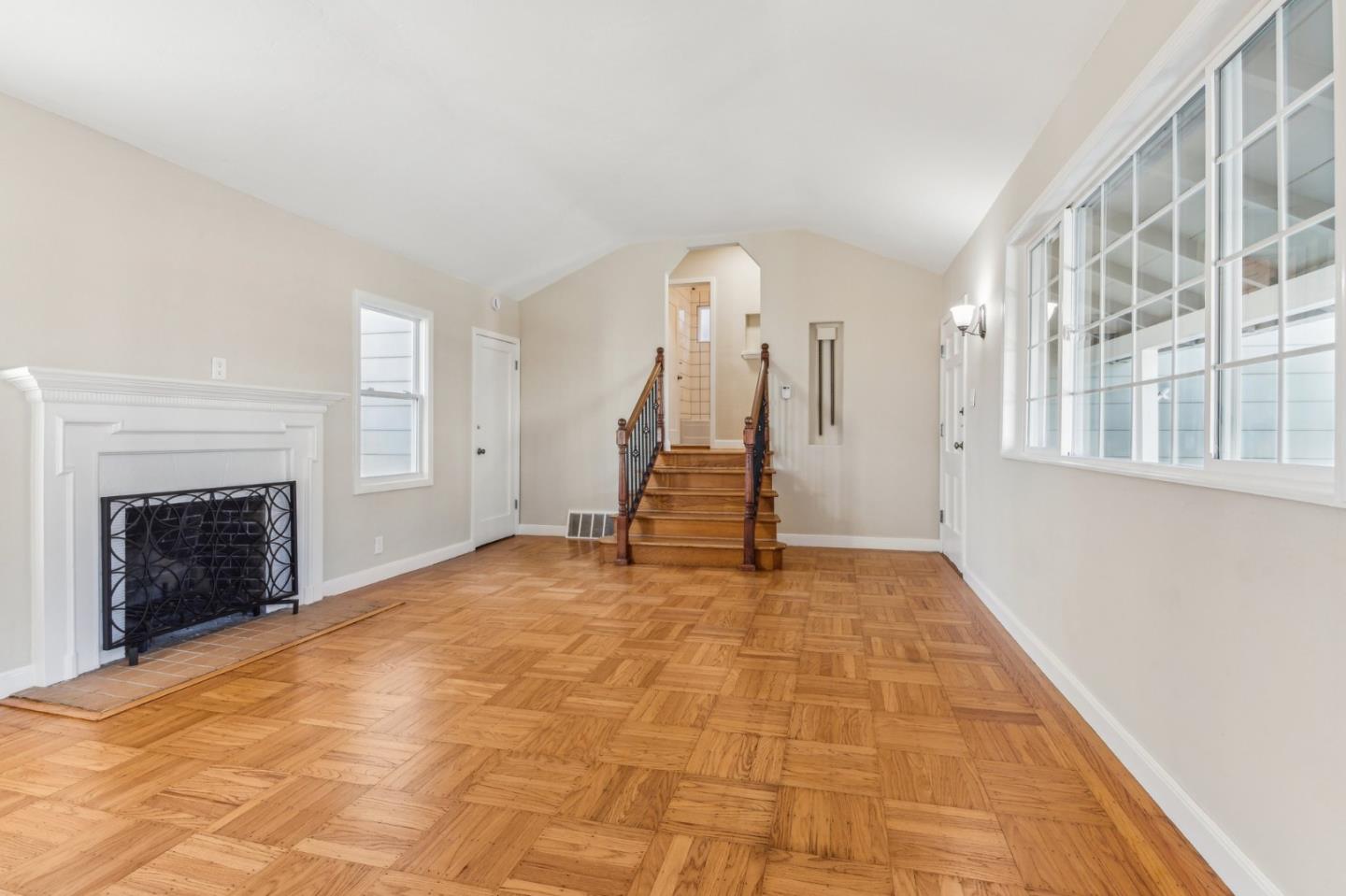 136 Chester Street Daly City, CA 94014 - Photo 6 of 48 a view of an empty room with a fireplace