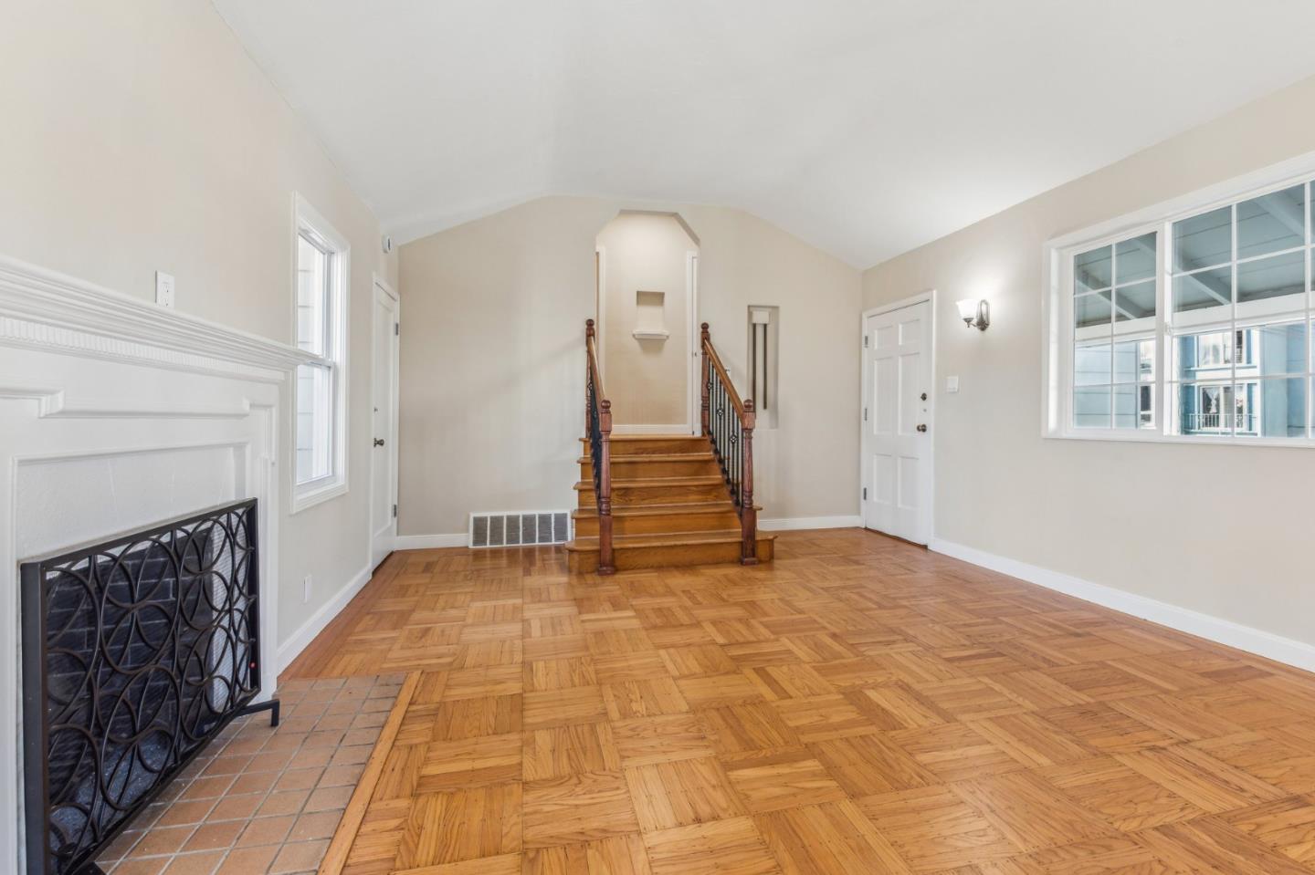 136 Chester Street Daly City, CA 94014 - Photo 10 of 48 a view of a livingroom with wooden floor and staircase