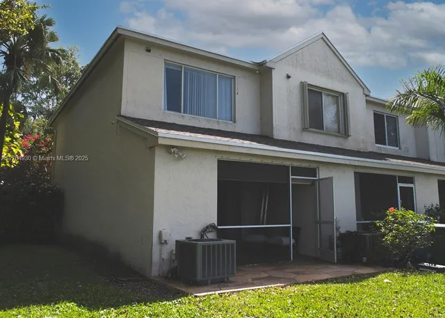 a house view with a outdoor space