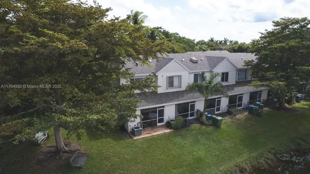 a view of a house with a garden