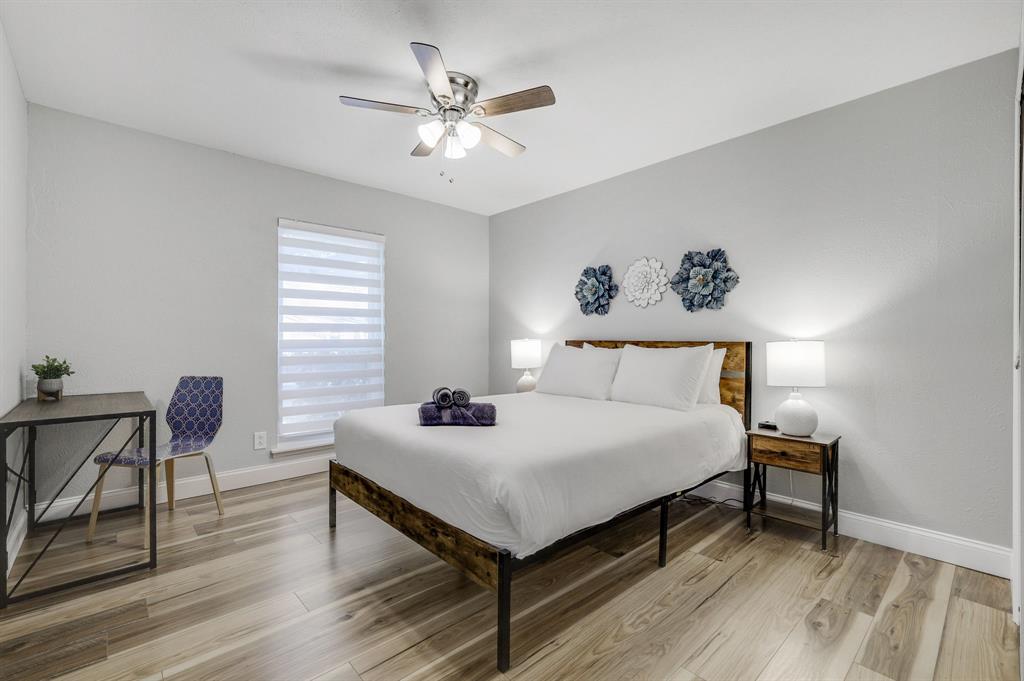 5112 Arbor Glen Road The Colony, TX 75056 - Photo 26 of 40 Bedroom featuring ceiling fan and light hardwood / wood-style flooring