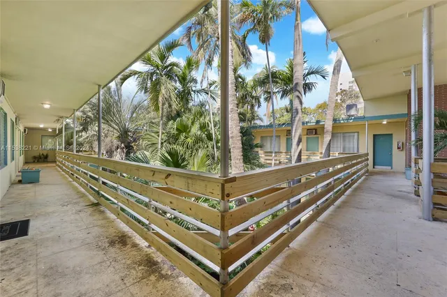 front view of a house with a garden