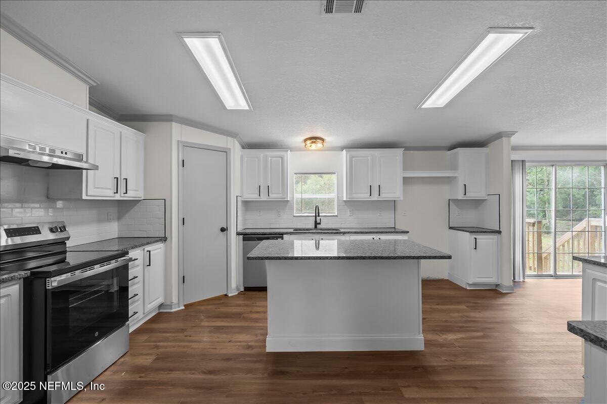 2929 Persimmon Street Bunnell, FL 32110 - Photo 8 of 28 12-JWLeeMedia1075