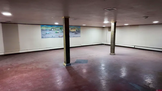 a kitchen with a sink and a stove top oven