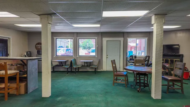 a view of a dining room with furniture