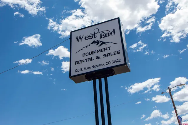 a view of a street with sitting area