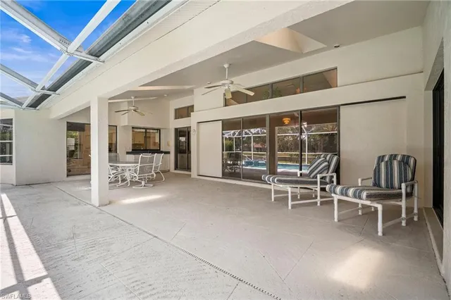a view of a hall with chairs