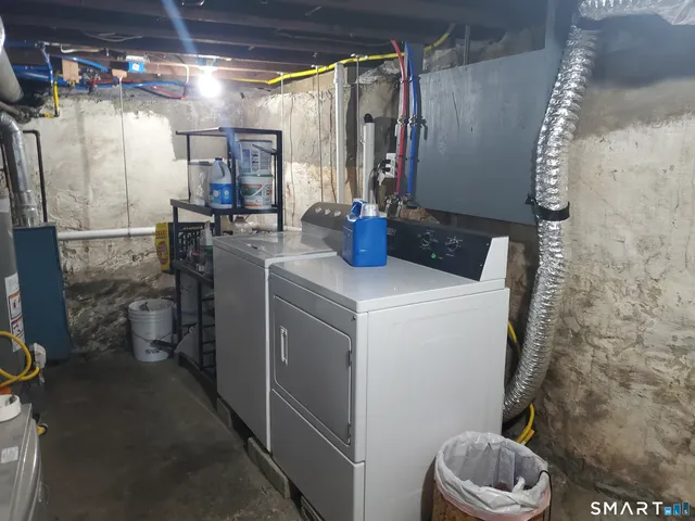a utility room with dryer and washer