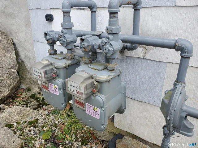 a bathroom with a sink mirror and toilet