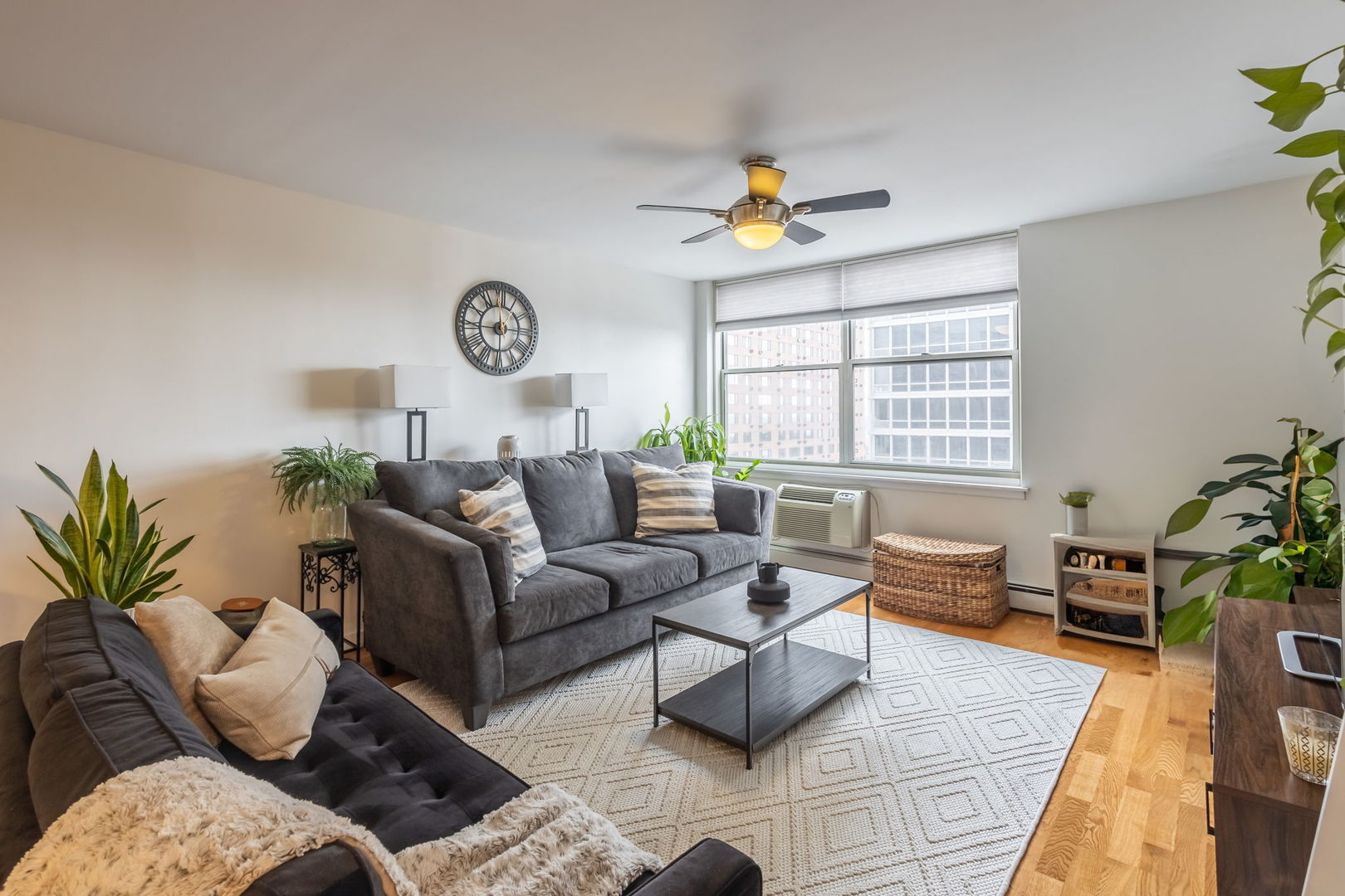 3033 North Sheridan Road, Unit 1203 Chicago, IL 60657 - Photo 2 of 22 a living room with furniture and a window