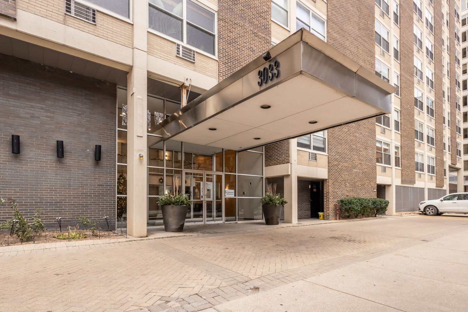 3033 North Sheridan Road, Unit 1203 Chicago, IL 60657 - Photo 21 of 22 a view of a building with a street