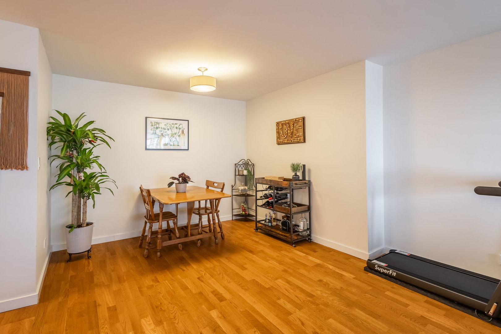 3033 North Sheridan Road, Unit 1203 Chicago, IL 60657 - Photo 6 of 22 a living room with furniture pool table and a potted plant