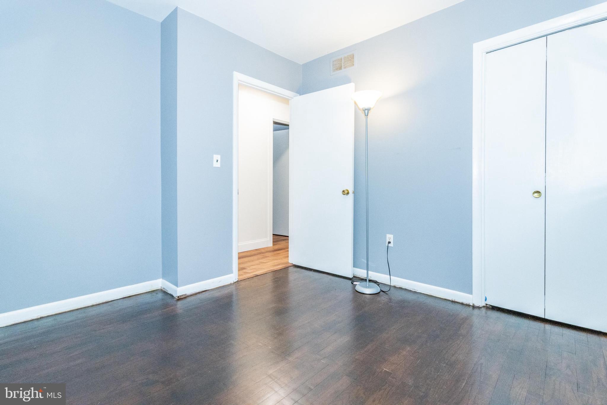 320 Kenmore Avenue Edgewater, MD 21037 - Photo 32 of 43 an empty room with wooden floor