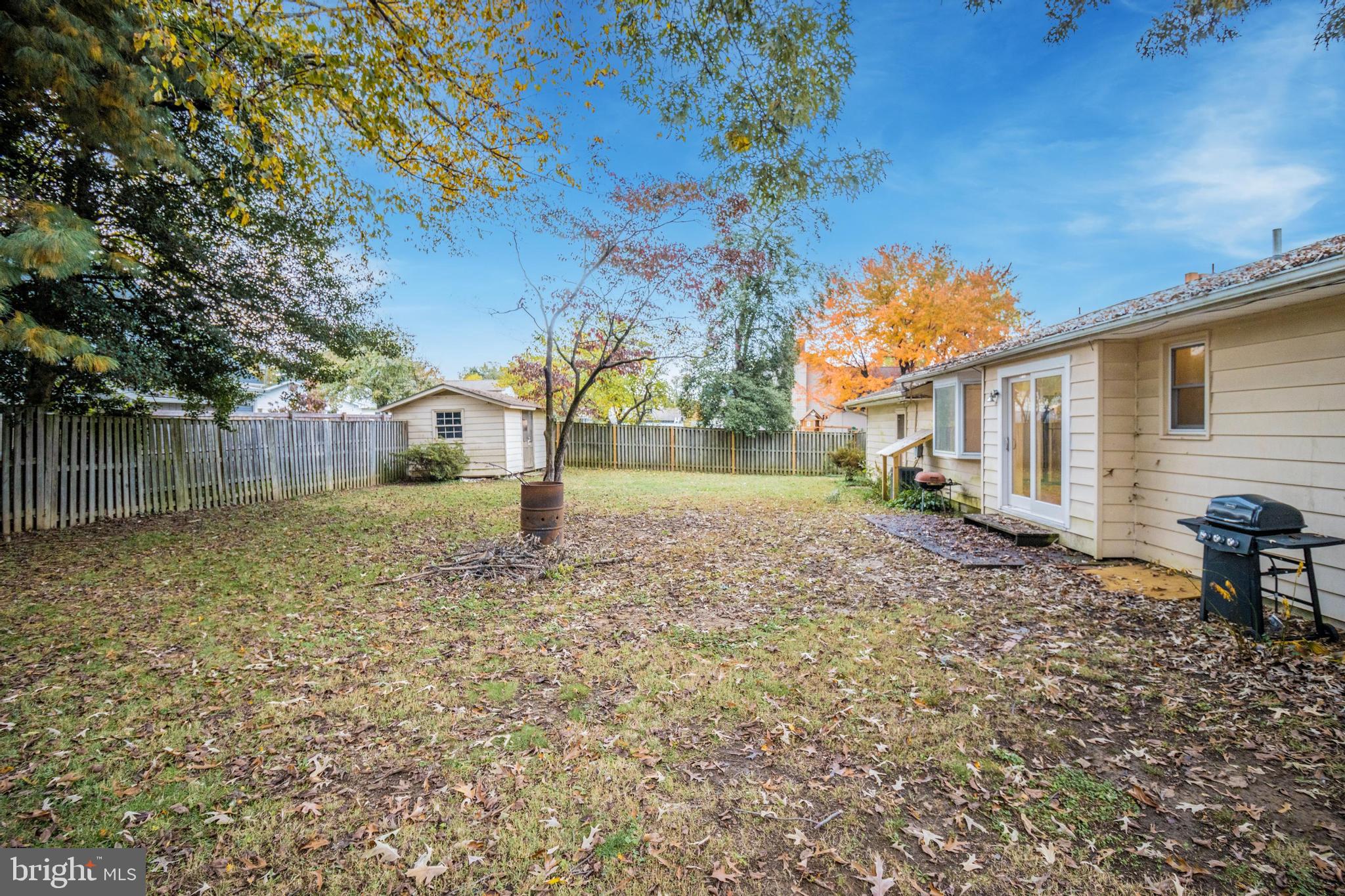 320 Kenmore Avenue Edgewater, MD 21037 - Photo 37 of 43 a backyard of a house with table and chairs