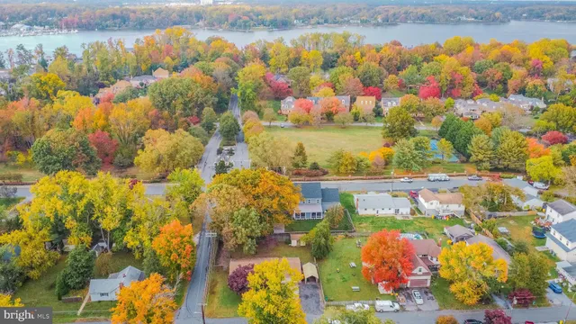 a view of a lake with outside a house