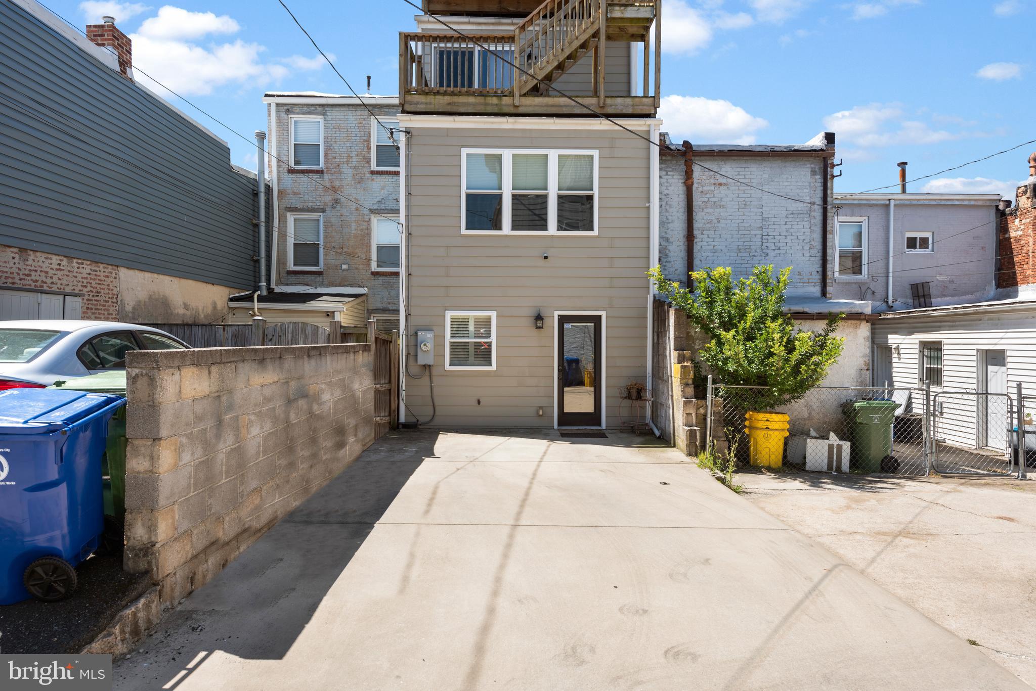 3032 Hudson Street Baltimore, MD 21224 - Photo 2 of 24 a backyard of a house with barbeque oven