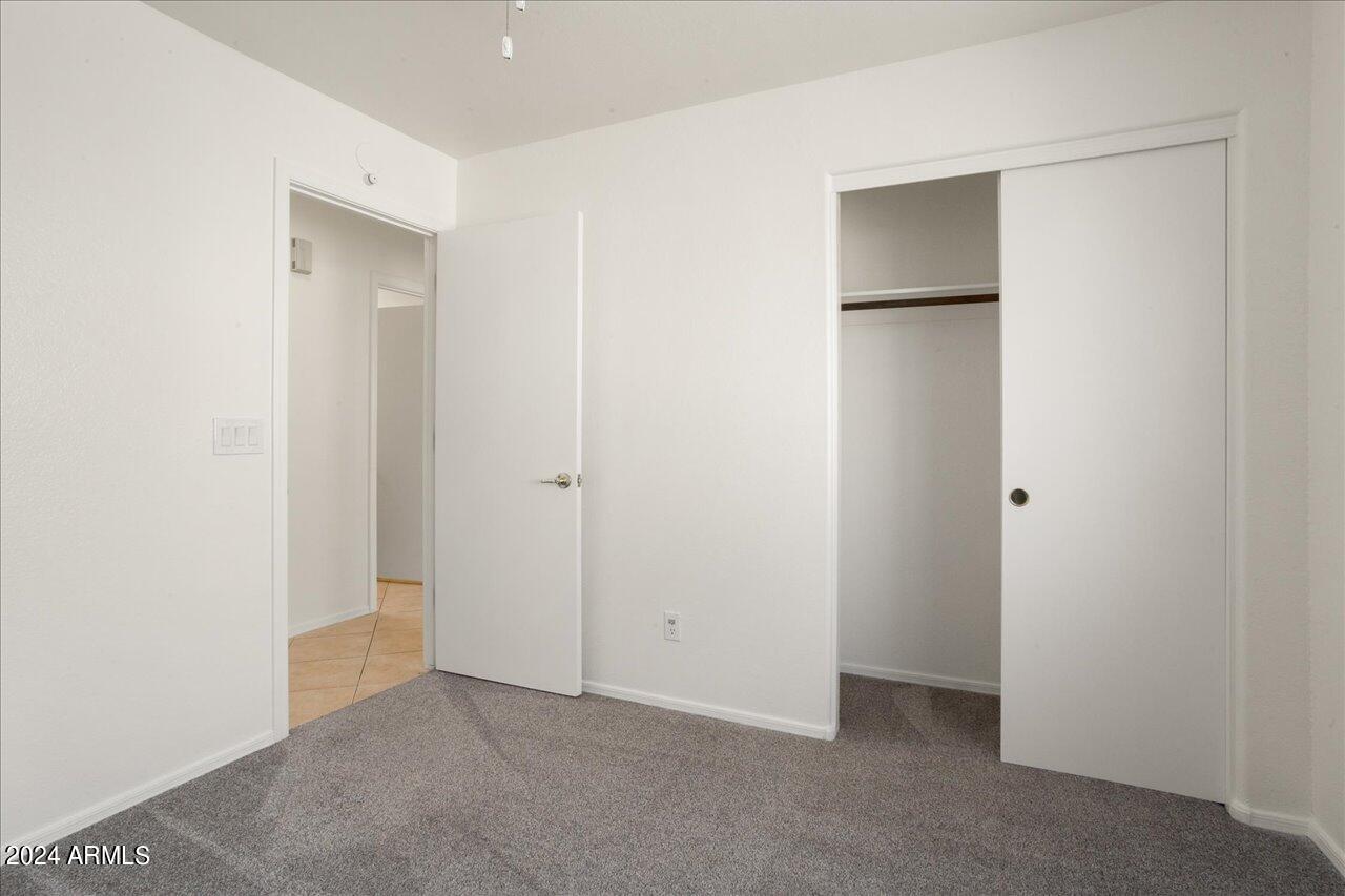 13379 West Boca Raton Road Surprise, AZ 85379 - Photo 19 of 37 a view of an empty room