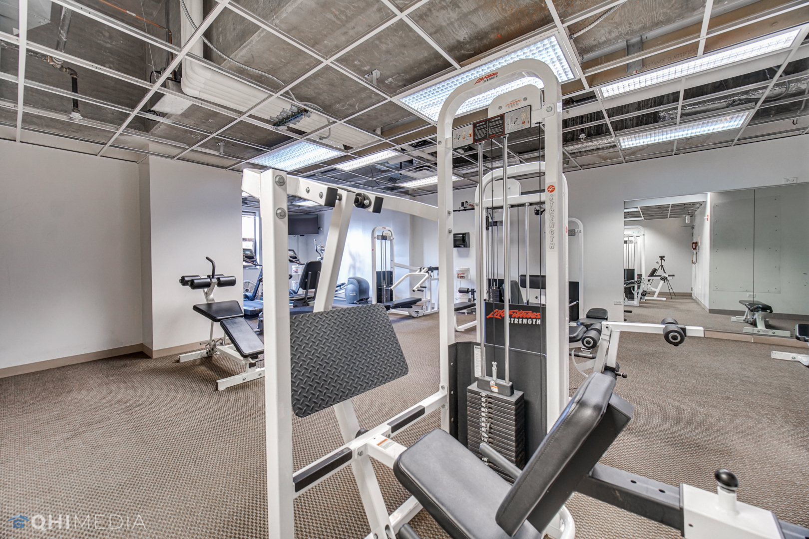 635 North Dearborn Street, Unit 1105 Chicago, IL 60654 - Photo 25 of 27 a view of a room with gym equipment