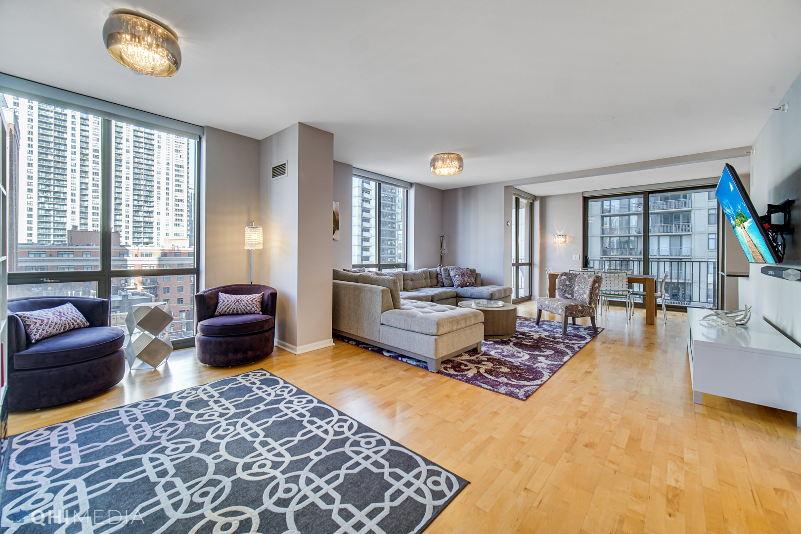 635 North Dearborn Street, Unit 1105 Chicago, IL 60654 - Photo 4 of 27 a living room with furniture and a rug