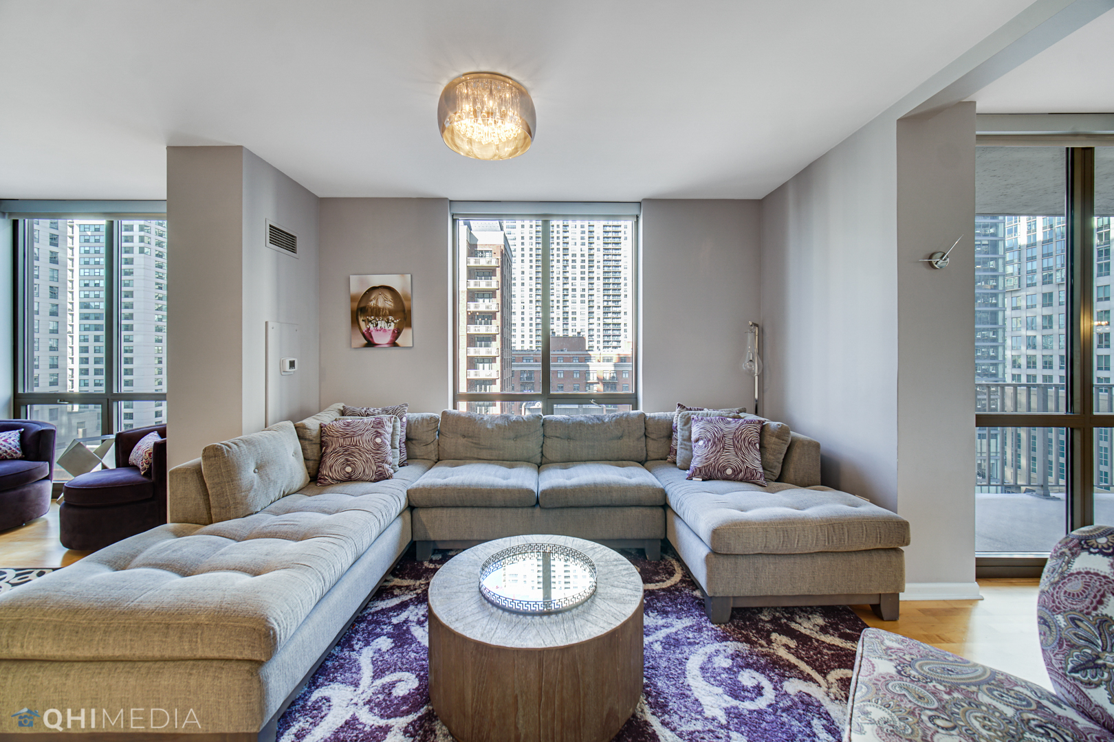 635 North Dearborn Street, Unit 1105 Chicago, IL 60654 - Photo 6 of 27 a living room with furniture and a large window