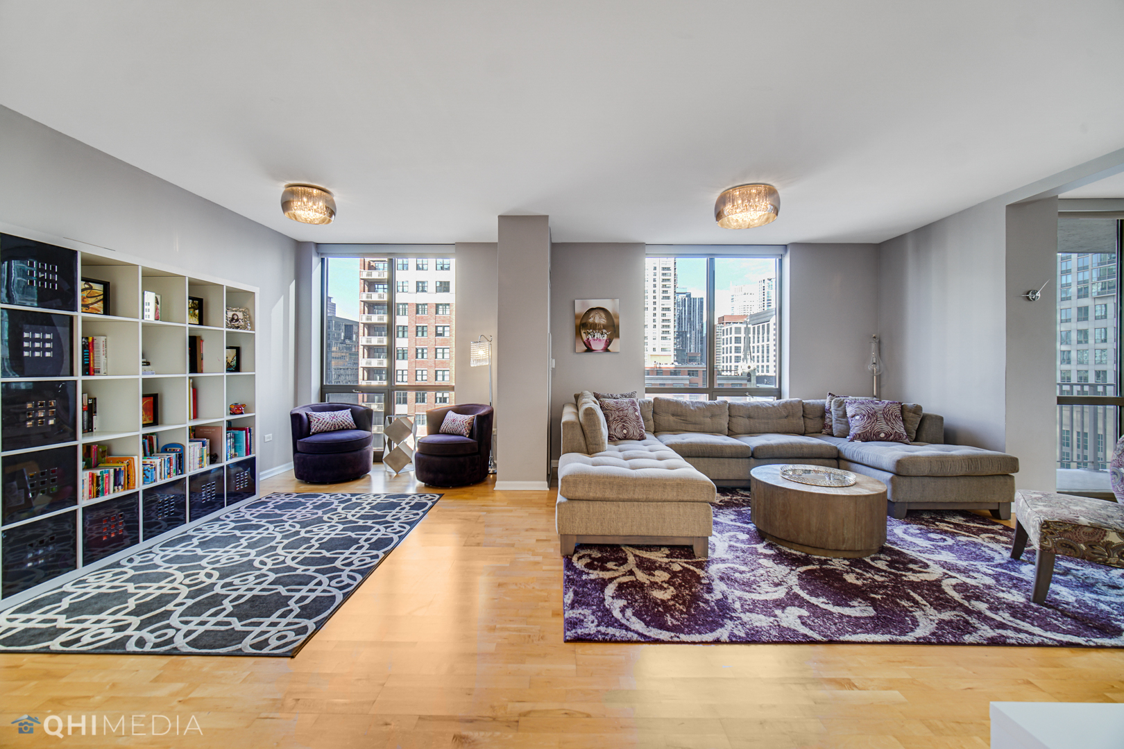 635 North Dearborn Street, Unit 1105 Chicago, IL 60654 - Photo 7 of 27 a living room with furniture and a rug