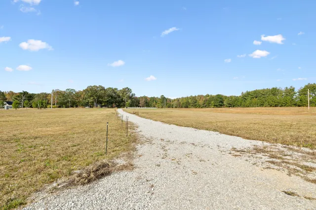 a view of lake with green space