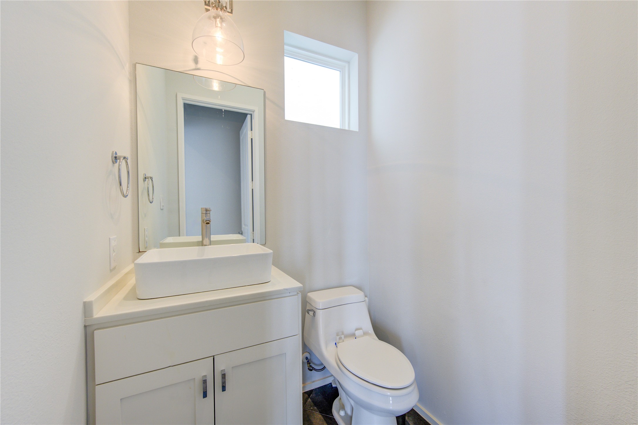 5336 Chandler Street Houston, TX 77007 - Photo 22 of 35 Powder room on second floor