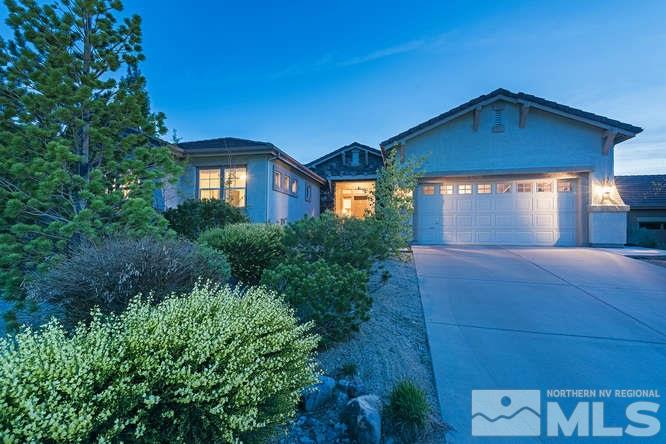 613 Rabbit Ridge Court Reno, NV 89511 - Photo 1 of 1 a front view of a house with a yard