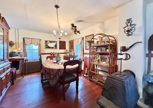a view of washer and dryer with kitchen in the background
