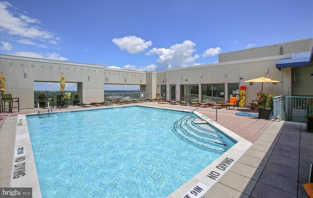 851 North Glebe Road, Unit 1113 Arlington, VA 22203 - Photo 6 of 30 a swimming pool view with a outdoor space