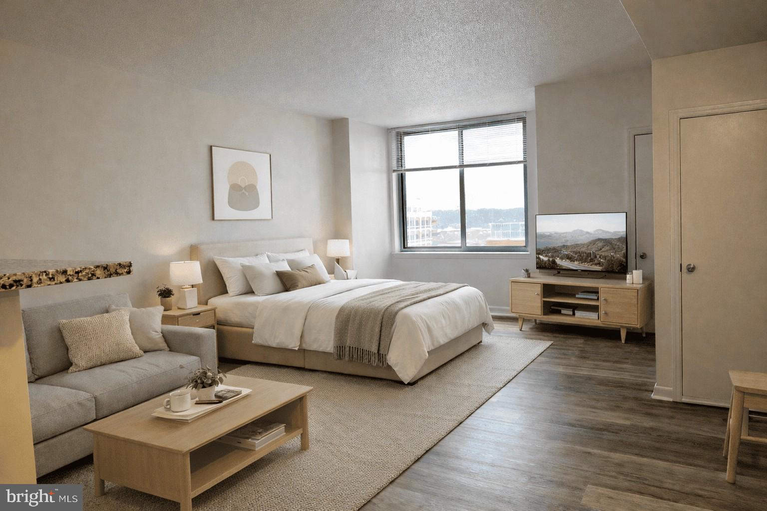 851 North Glebe Road, Unit 1113 Arlington, VA 22203 - Photo 7 of 30 a spacious bedroom with a bed a couch and a window