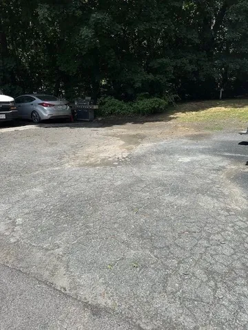 a view of swimming pool with yard