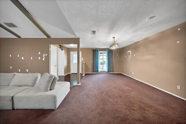 a view of livingroom and furniture