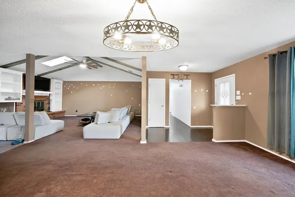 a view of an empty room and window