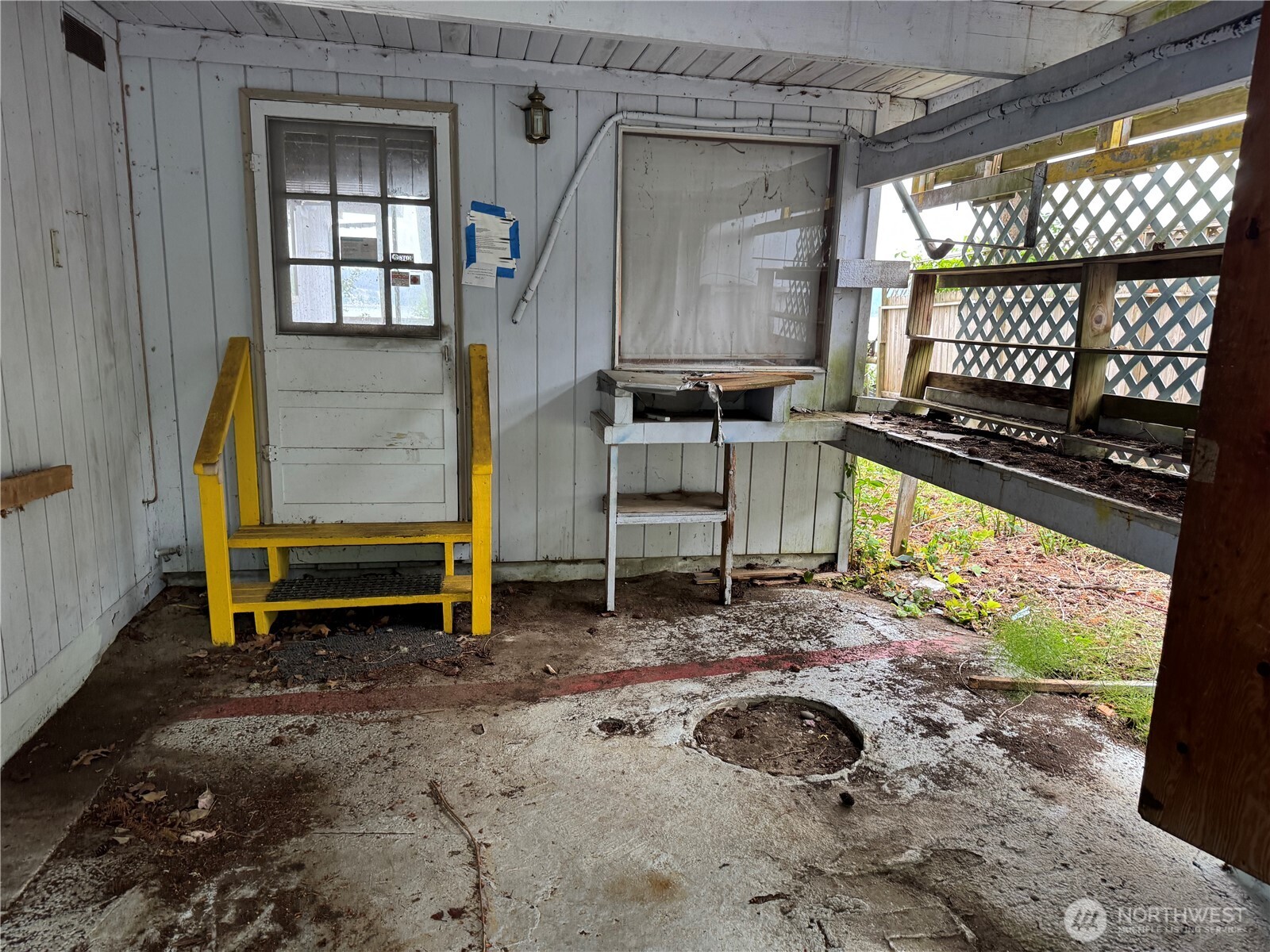 1284 Dines Point Road Greenbank, WA 98253 - Photo 20 of 39 a backyard of a house with barbeque oven table and chairs