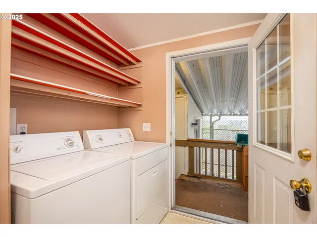 a view of wooden floor and cabinets