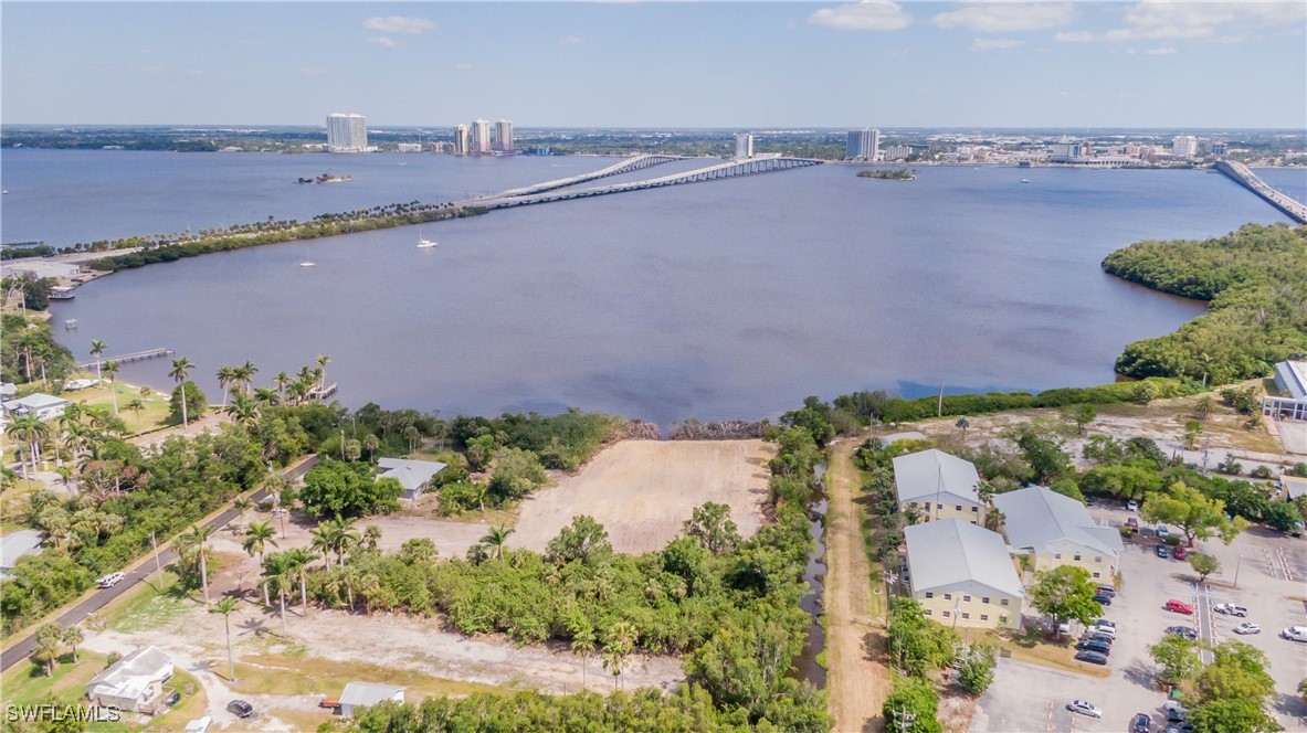 1059 River Road North Fort Myers, FL 33903 - Photo 11 of 15 an aerial view of a city and lake view