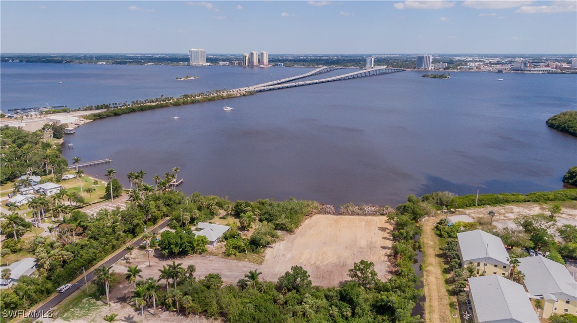 1059 River Road North Fort Myers, FL 33903 - Photo 13 of 15 an aerial view of a city and lake view