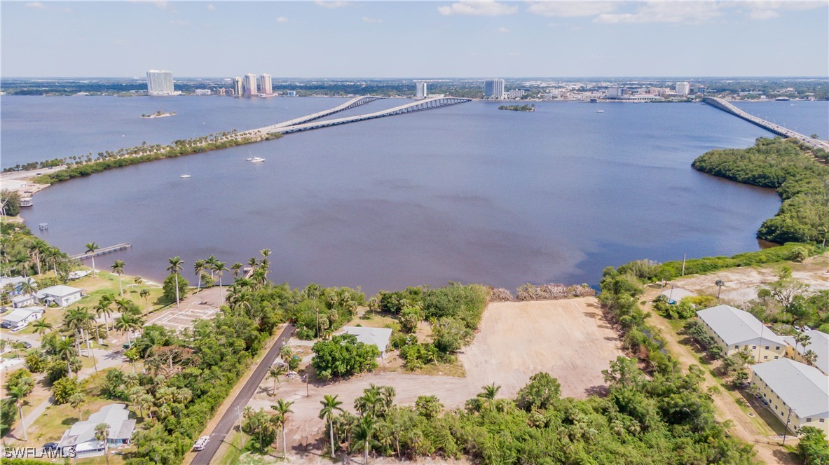 1059 River Road North Fort Myers, FL 33903 - Photo 14 of 15 an aerial view of a city and lake view