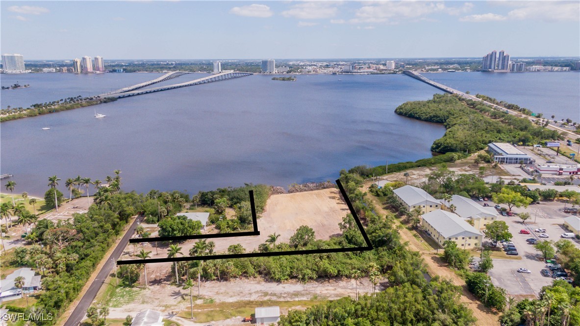 1059 River Road North Fort Myers, FL 33903 - Photo 2 of 15 an aerial view of a city
